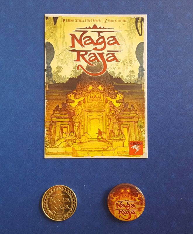 les goodies du FIJ de Cannes : une carte postale, un badge et une belle pièce Nagaraja !!!