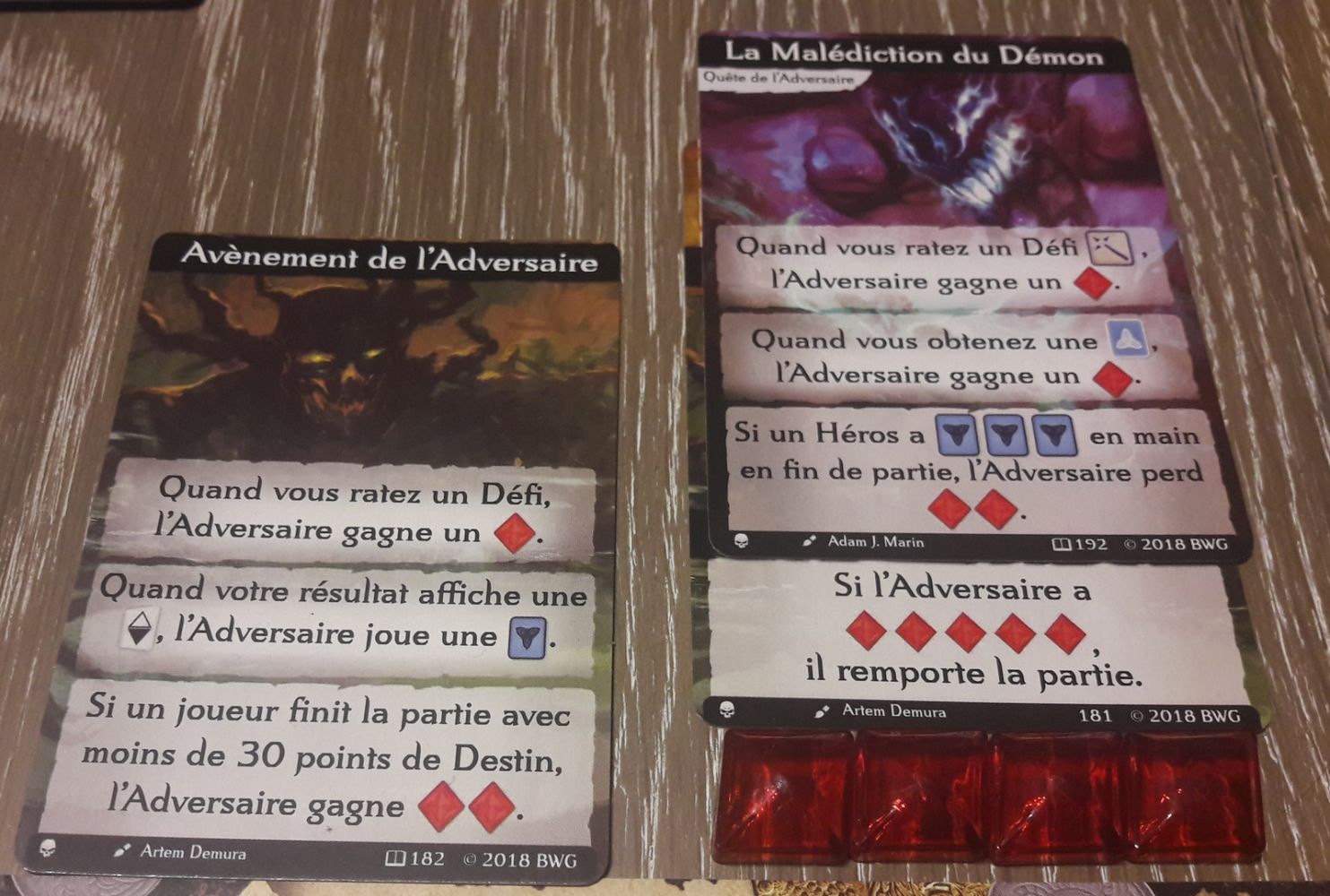 La “quête du démon” lui donne des points lorsque vous tirez une carte Héros.