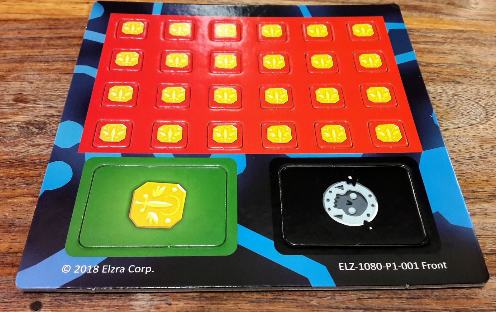 Les petits pions sont recto-verso Crane/Epée et représentent les points de vie de chaque équipe.