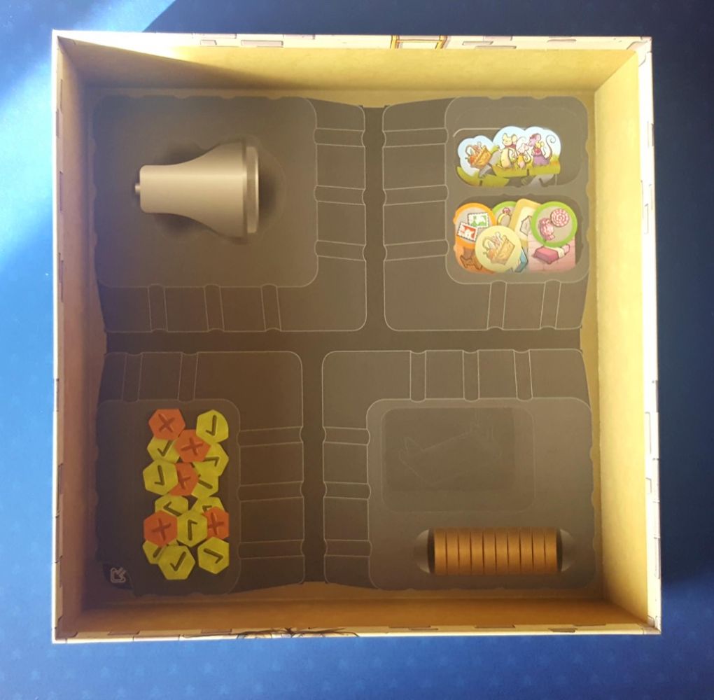 L'intérieur de la boite avec un rappel des dessins du matériel qui servira à bien installer la maison.