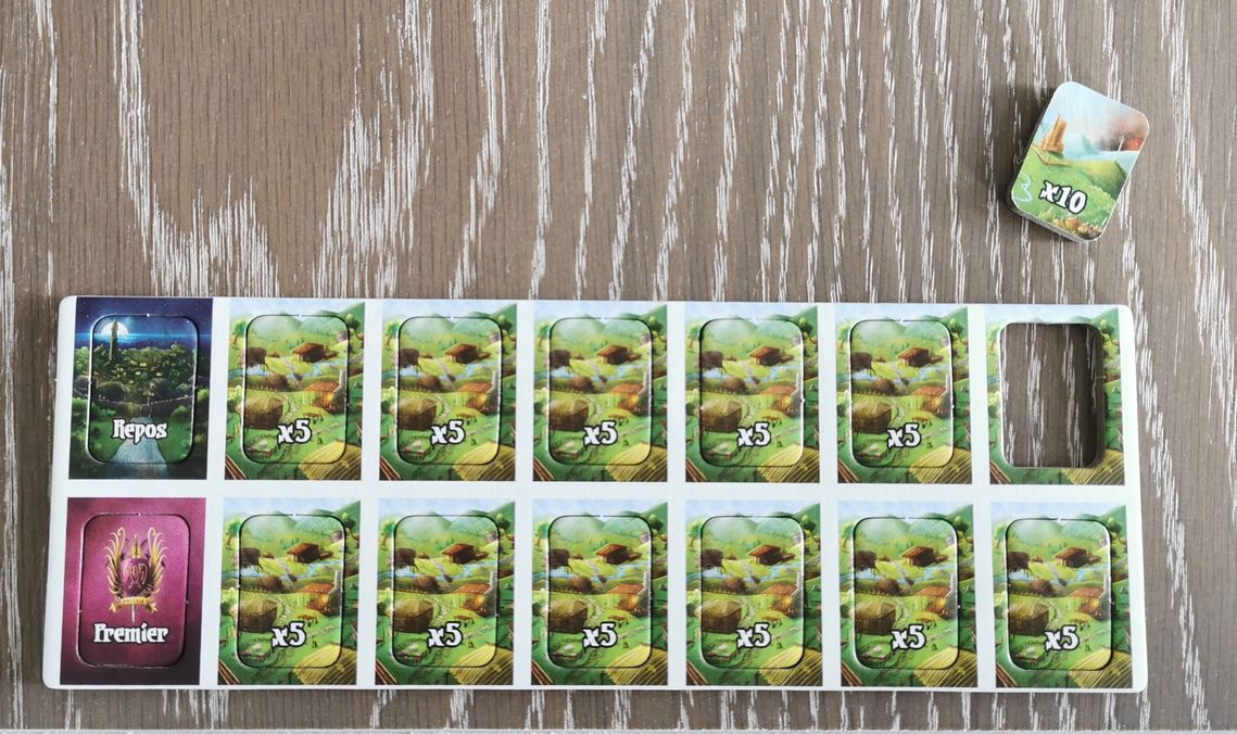 Jetons Repos utilisé à 5 joueurs pour inhiber une récolte, jeton premier joueur, et multiplicateurs de ressources .