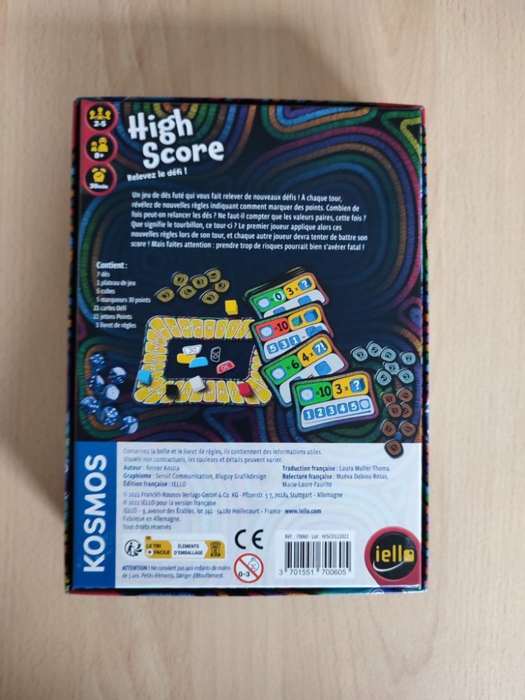 Le dos de la boite avec une vue du matériel et une petite explication du jeu.