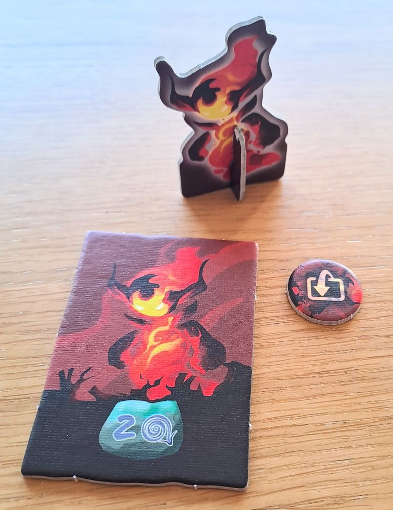 Il possède son propre pion et avancera sur le plateau du cercle des esprits en rajoutant du feu.