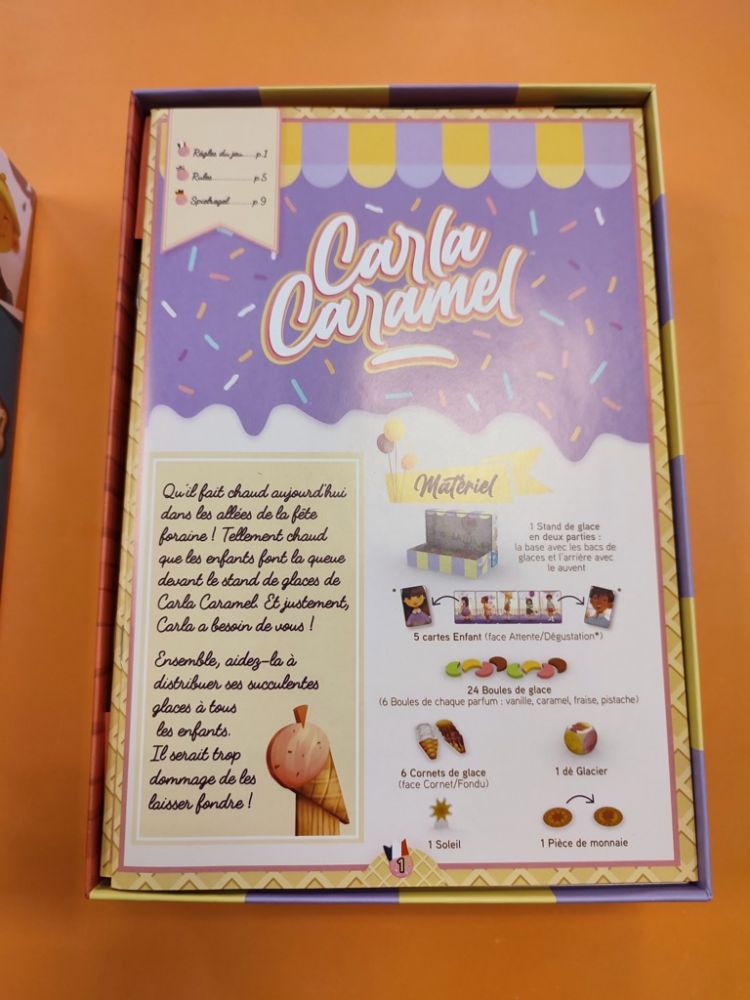 Le livret de règles : français, anglais et allemand.