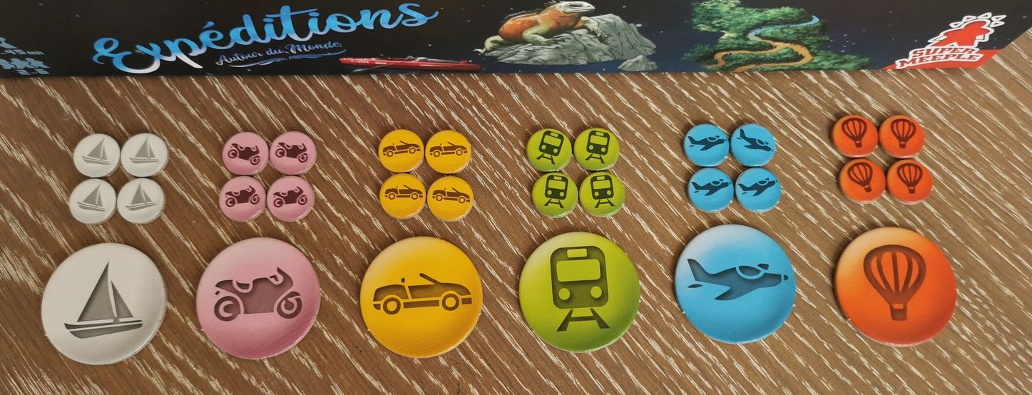 Les jetons des joueurs. Les petits sont utilisés pour marquer les 4 destinations d'expédition pendant le phase de préparation.