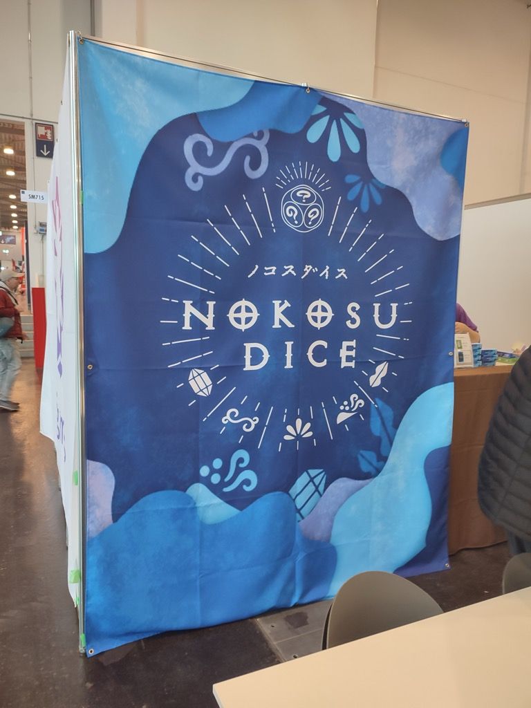 Nokosu Dice un jeu de Yusuke Matsumoto illustré par Sai Beppu chez l'éditeur japonais Engames.