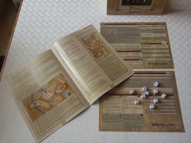 les règles, les aides de jeux et les dés