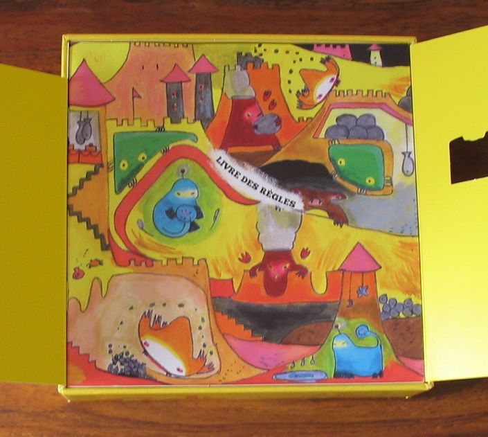 Le livre de règles sert d'illustration de l'Onivers quand on ouvre la boite