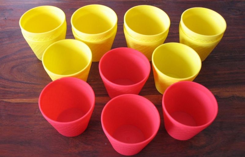 14 gobelets panier (10 jaunes, 4 rouges)