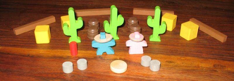 2 derniers cowboys neutres, des éléments de décors, les balles et le pion mouvement