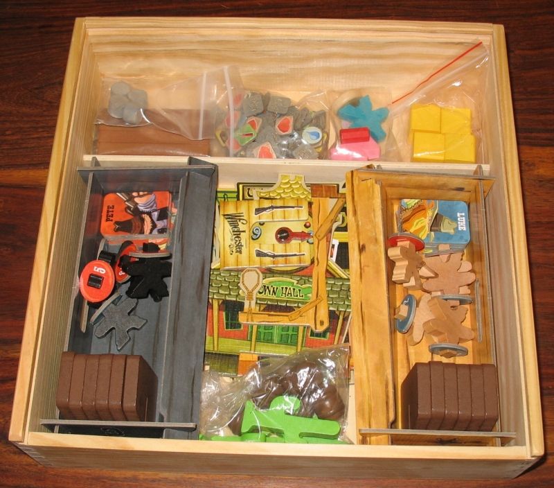 Tout rentre parfaitement dans la boite, dommage qu'il faille démonter les supports des batiments...