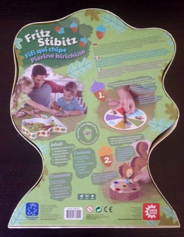 Le dos de la boîte avec un rappel des règles dans 3 langues.