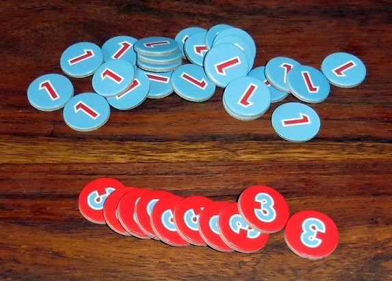 Des jetons de 1 et 3 points pour compter le score