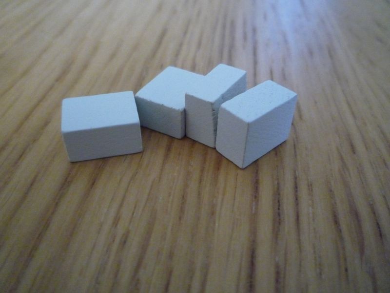 Les jetons en bois pour chaque joueur