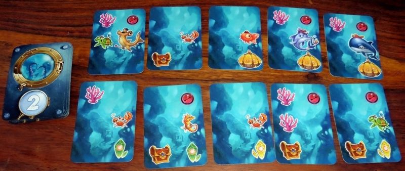 Chaque carte exploration comporte des poissons, des cristaux, du corail...