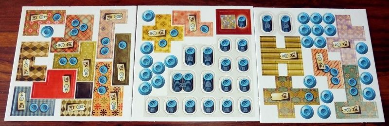 Encore des pièces de patchwork à dépuncher et des tas de boutons qui serviront de monnaie et de points de victoire !