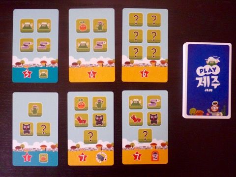 Quelques exemples de cartes parmi les 32 cartes du jeu avec les ressources pour les acquérir, les PV et les pouvoirs.