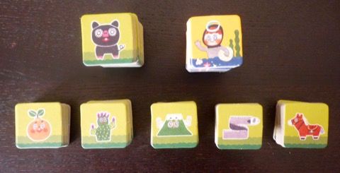 80 tuiles de 7 types différents avec de haut en bas : le cochon Jeju noir, la plongeuse Haenyeo, l'orange, le cactus, la montagne volcan Hallasan, le poisson et le poney.