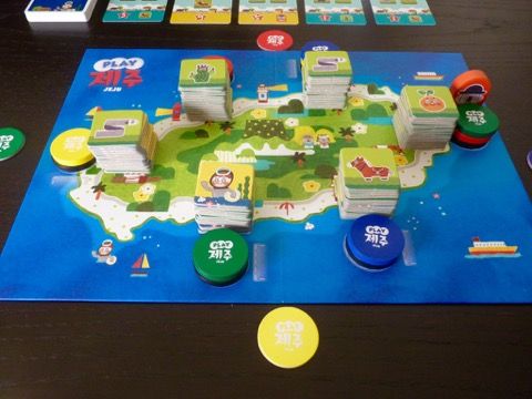 Une mise en place pour 4 joueurs.