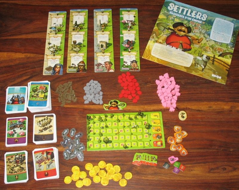 Une belle vue d'ensemble de ce riche matériel avec notamment les jetons Or, razzia et défense...