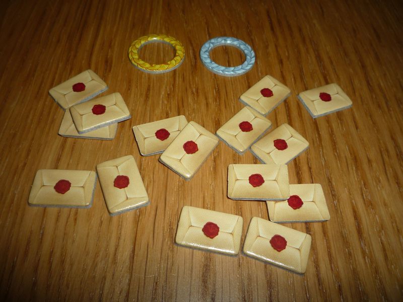 Les jetons privilèges, ainsi que l'anneau du Roy et de la Reine.