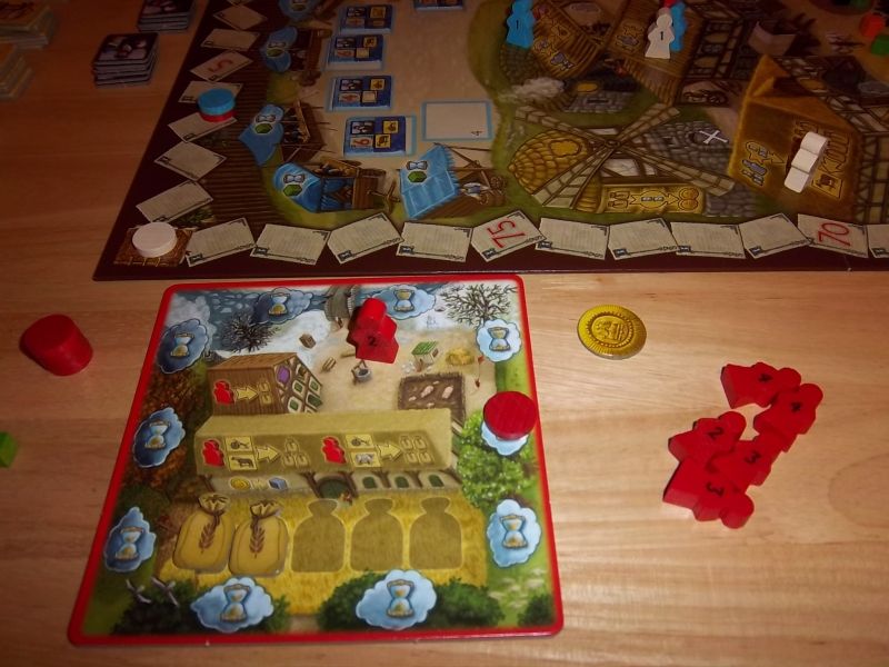 Un plateau individuel, avec la piste de temps...à coté, de futurs villageois qui attendent de naître...