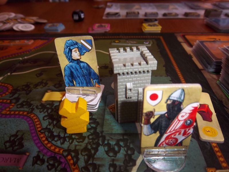 Deux nobles seigneurs, un château, et...un lapin. Oui, cette chose jaune là, c'est un lapin, certainement pas un moulin !