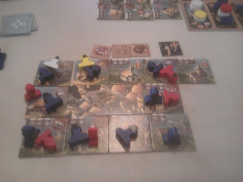 Mon village un peu flou. Beaucoup de personnages couchés et épuisés par le travail, mais un centre-ville entouré bientôt !