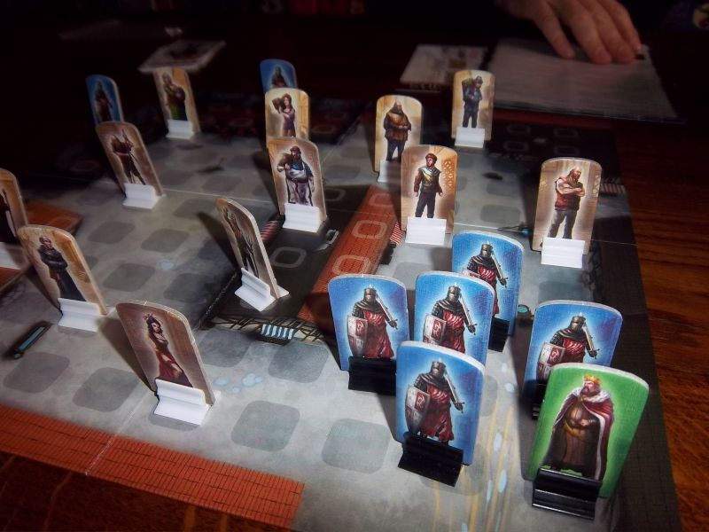 Mise en place : Les habitants, des gardes et le roi. 