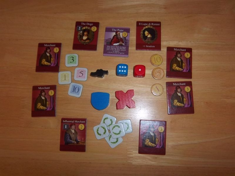 Le doge de Venise et ses sbires, entourant quelques éléments matériels du jeu. Faut-il y voir un signe ? Rappelons que Venise commence avec le statut le plus haut...