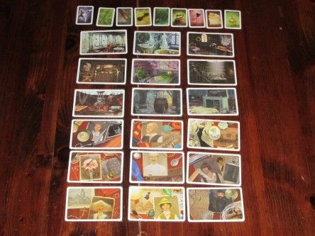 Exemple d’une mise en place des cartes (9 pour chaque type) pour Tajemnicze Domostwo (photo : Board Game Geek).