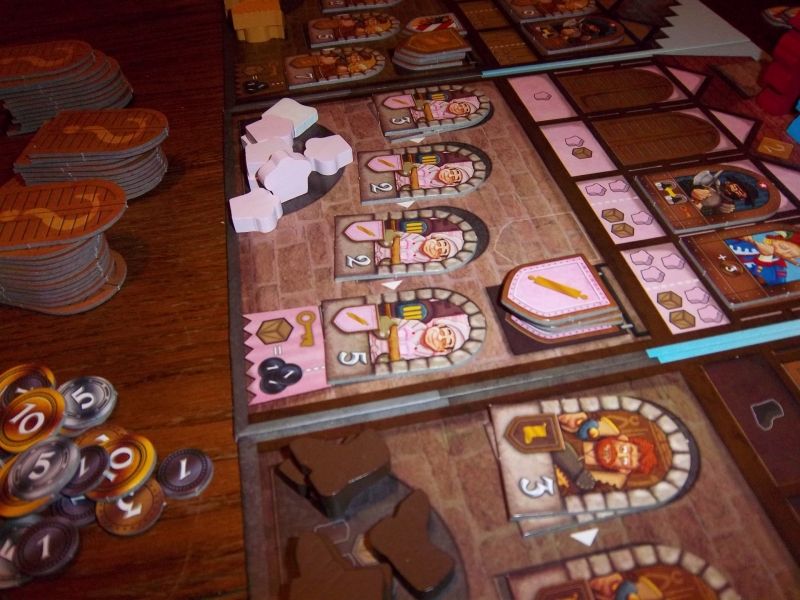 Guilde des boulangers, en bas guilde des cordonniers...