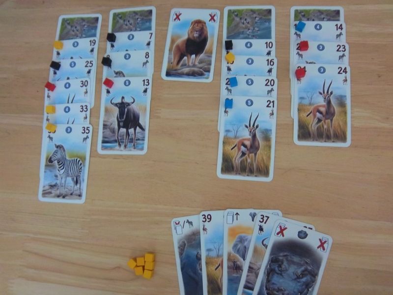 Vous avez la main de cartes du joueur jaune. C'est votre tour... que jouez-vous ? 